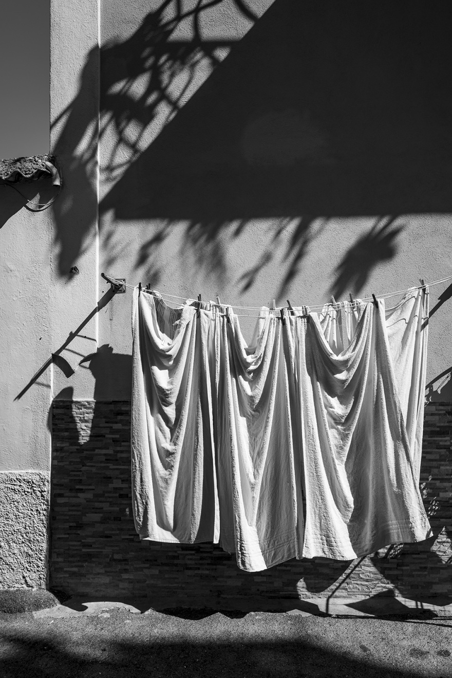 Towels drying on washing line in street, Ischia town, Isle of Ischia, Italy Black and white Monochrome urban street abstract portrait ©P. Maton 2018 eyeteeth.net